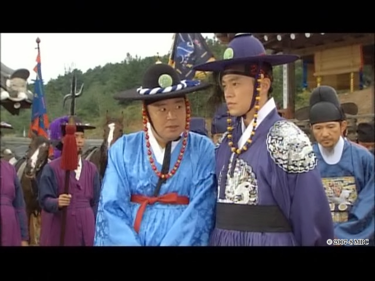 相談する男性たち