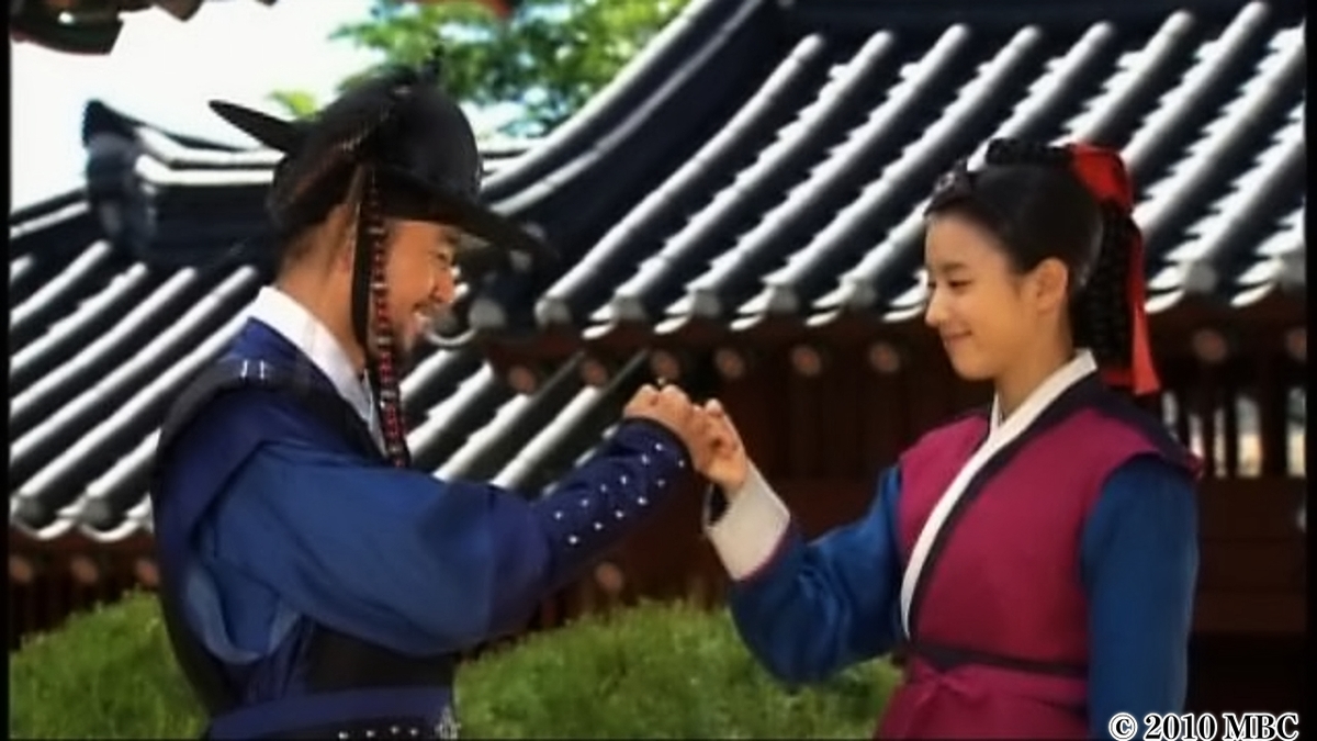 指きりをする男女