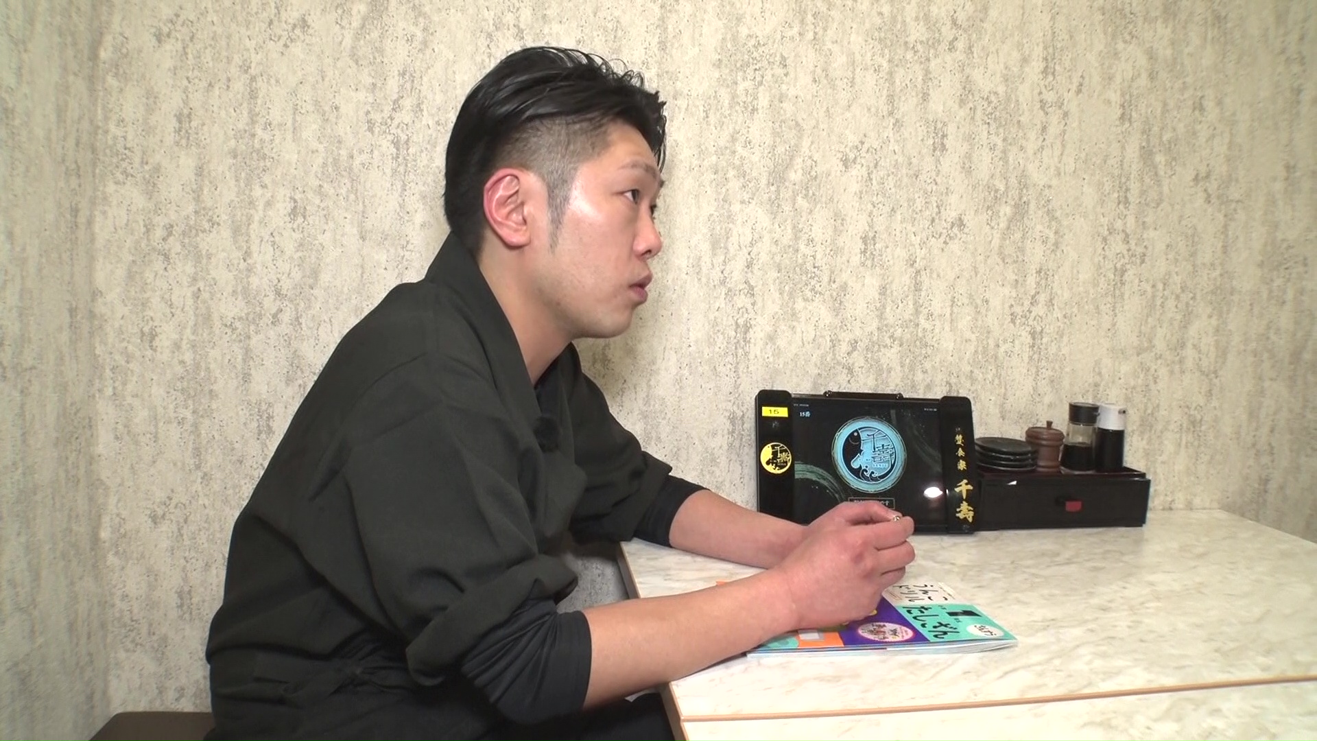 大将の亀田俊幸さんが話す様子